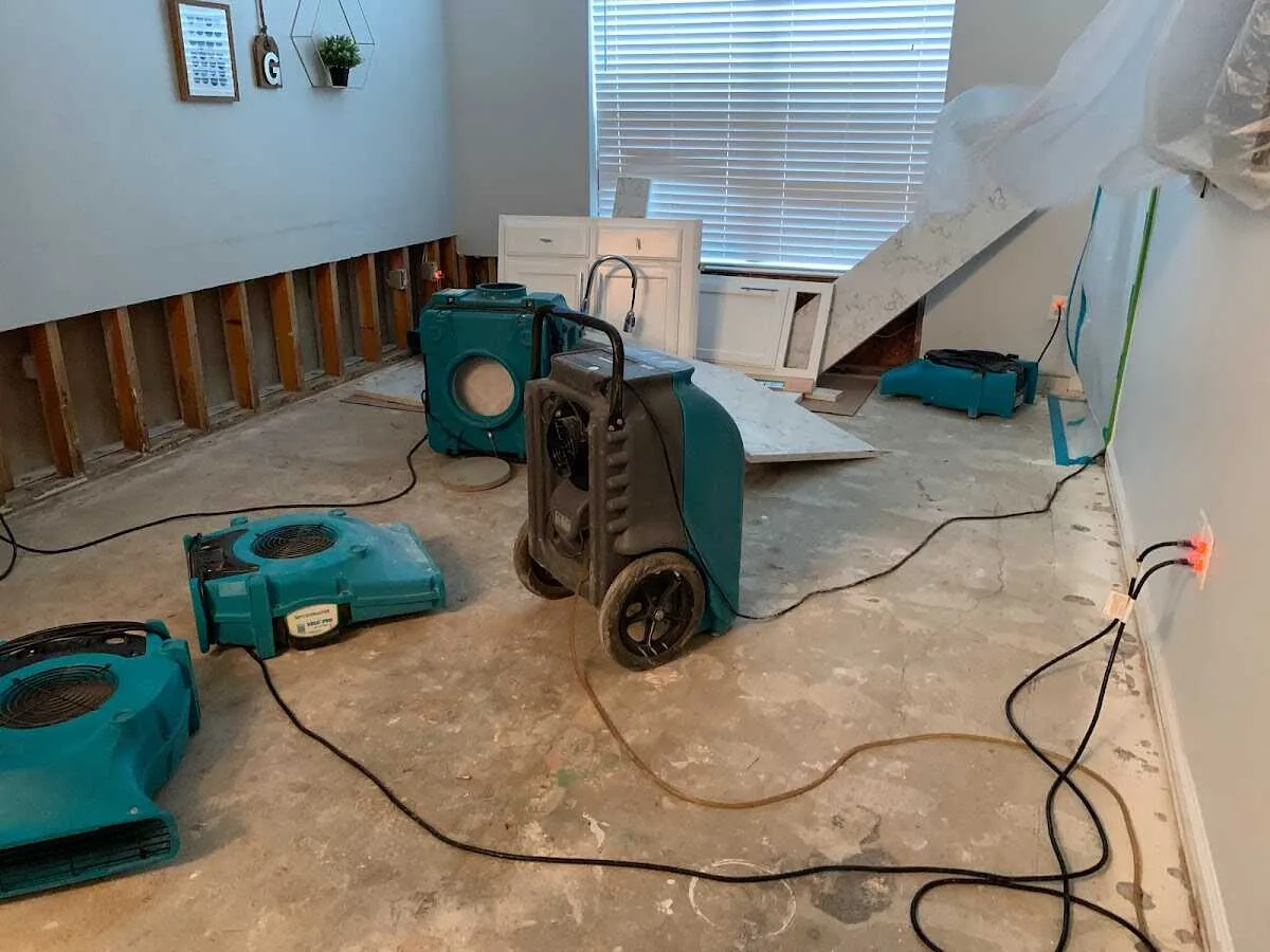 Dehumidifier in flood-cut room for Water Damage Restoration in Mitchell